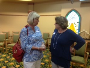 WeCAB Board of Director Pastor Barbara Hosmer and Eastern Carver County Rider Registrar Jackie Engel.